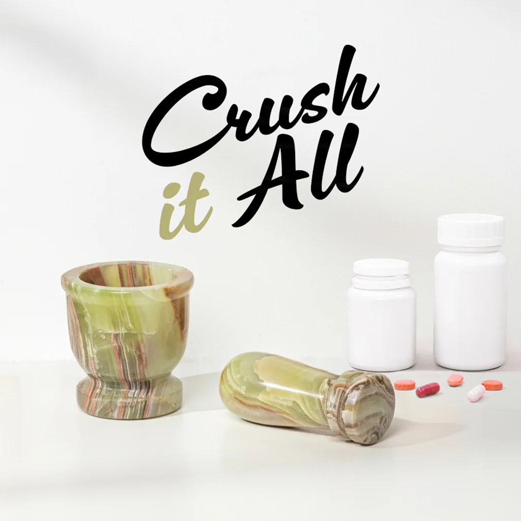 Crush it All - Mini Crusher mortar and pestle for crushing pills and tablets, shown with medicine bottles and capsules