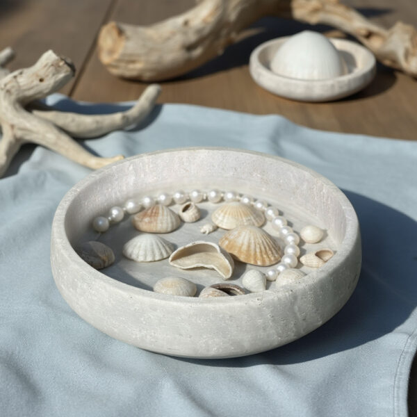 Natural stone travertine bowl 12 inch filled with decorative potpourri for home fragrance