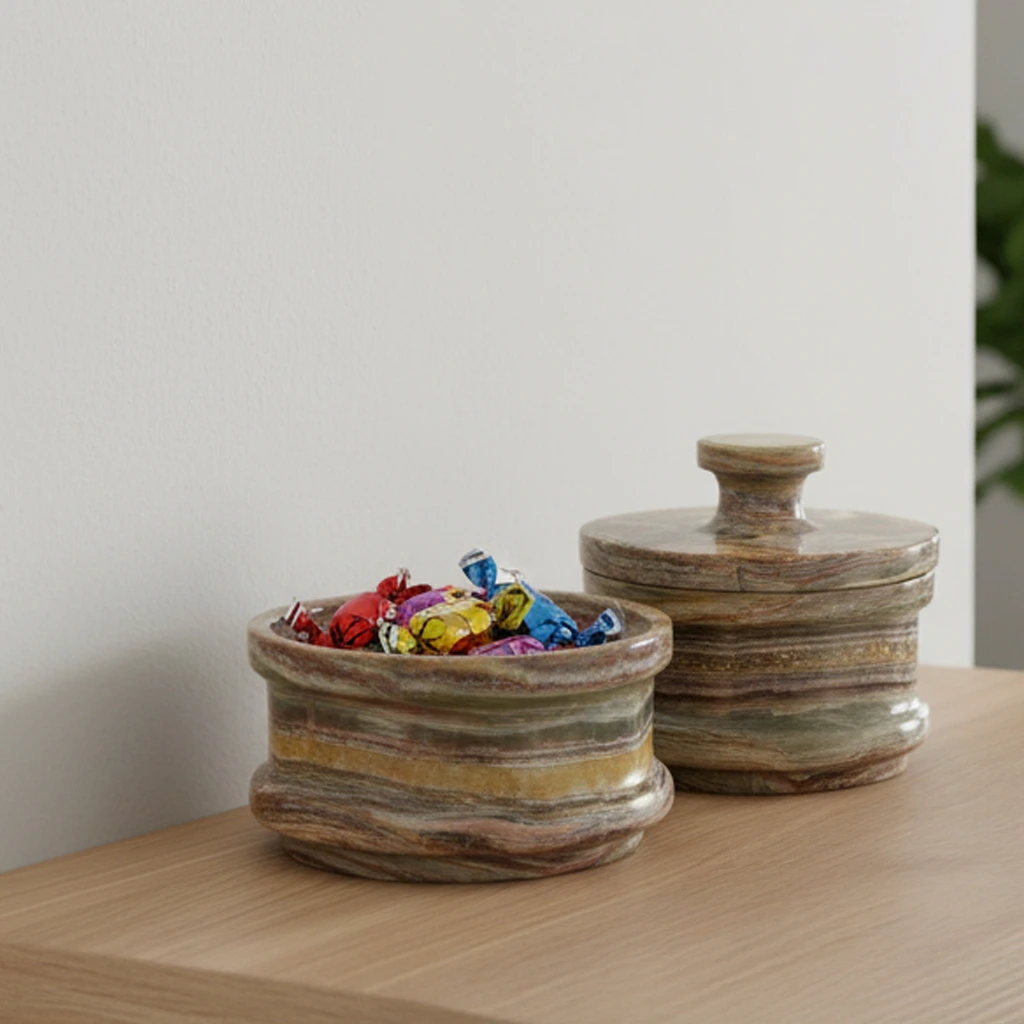 Onyx marble dual candy containers on wooden surface, one open showing wrapped colorful candies inside